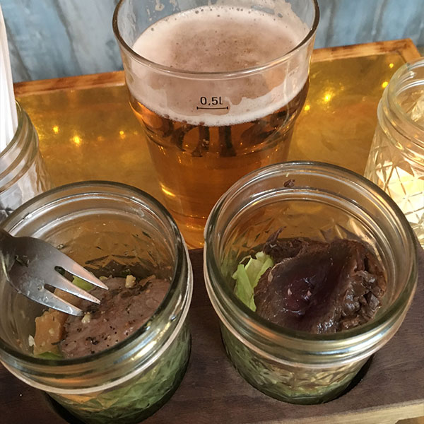 Icelandic tapas, including whale in a jar.