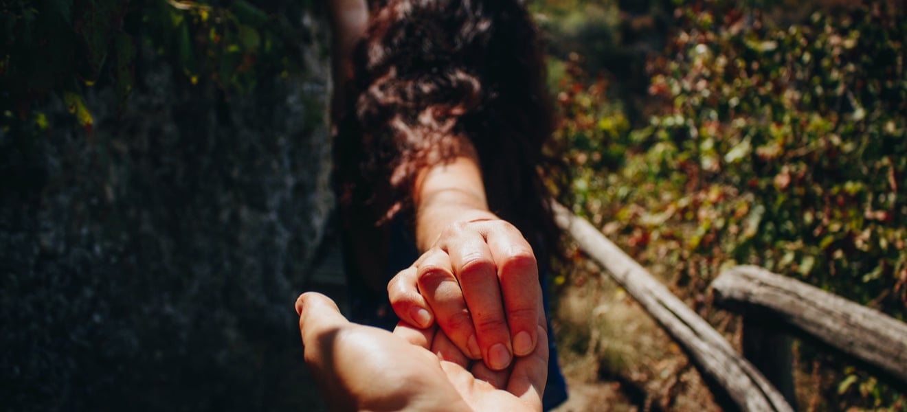 Holding hands.