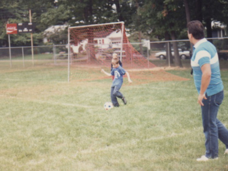 Photo of me playing soccer as a kid.