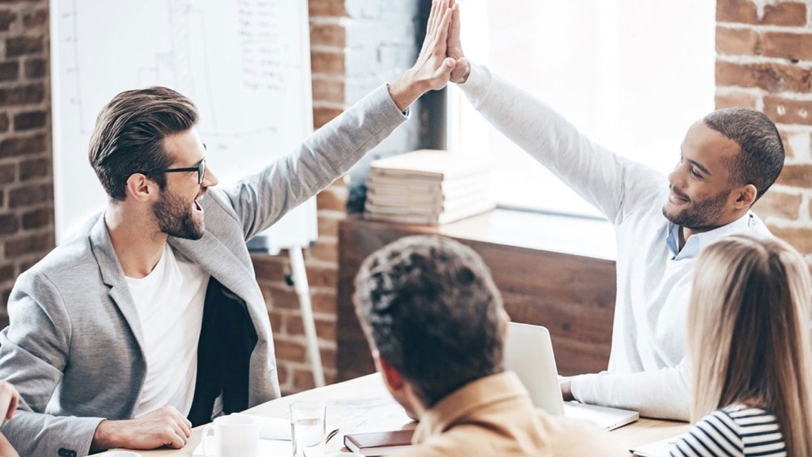 Hi-five in a meeting.